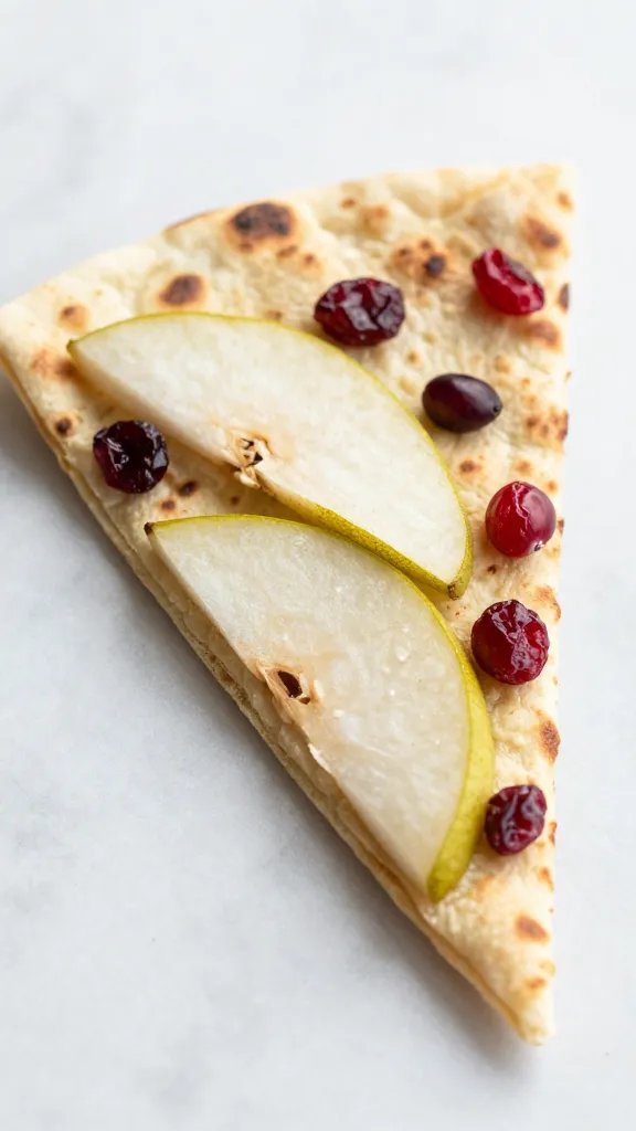 single flatbread wedge with pear slices and cranberries