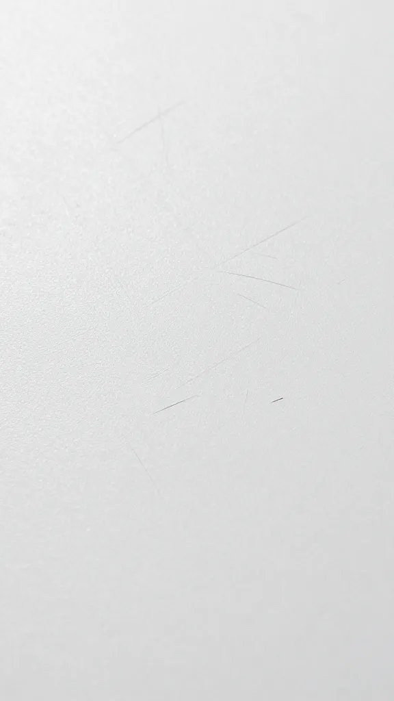 scratched clip surface showing outdoor wear, macro shot