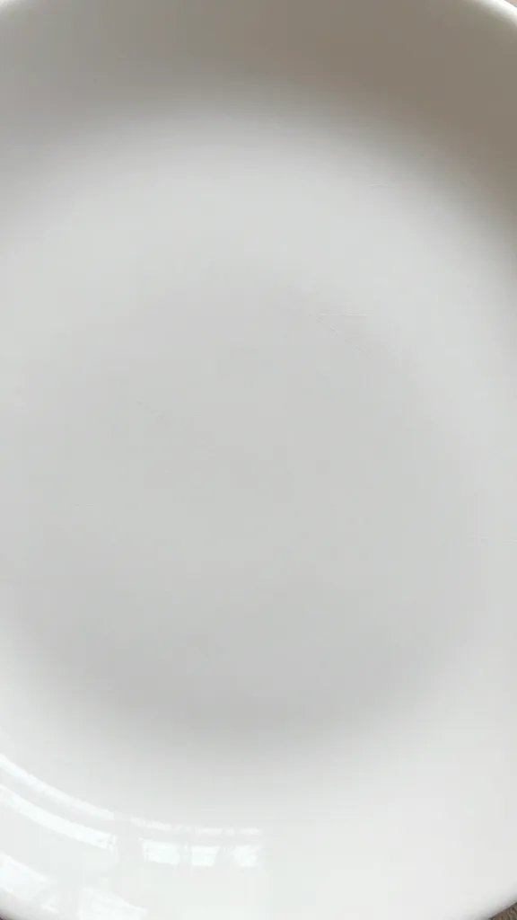 scratched melamine plate surface texture, macro shot