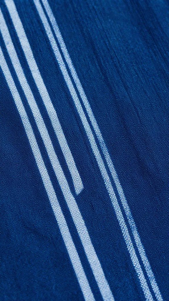 indigo-dyed Adire fabric selvage edge, macro