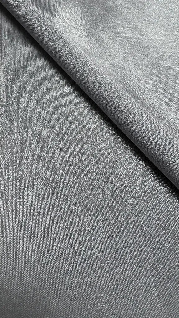 satin weave macro highlighting reflective threads