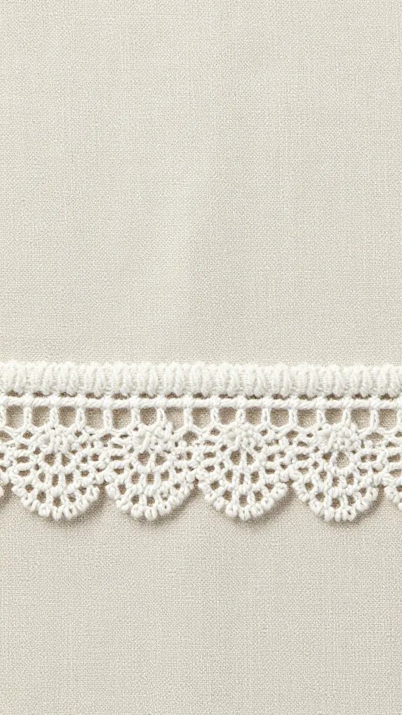 delicate openwork hemstitch on bleached linen, closeup