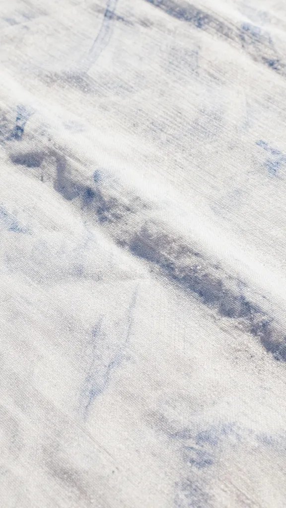 closeup of a pastel picnic blanket texture in sunlight
