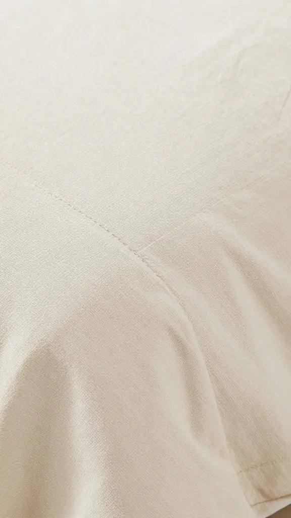 closeup of blanket seam line emphasizing texture and depth